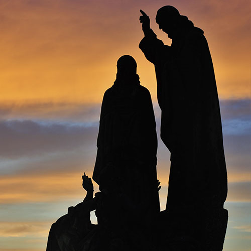 sunset silhouette of religious statues travel with Stratton Horres
